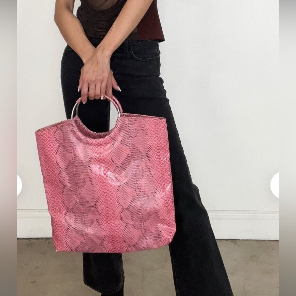 Kim Kardashian pink tote in faux snake print